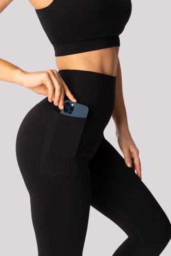 Sorte leggings med lomme