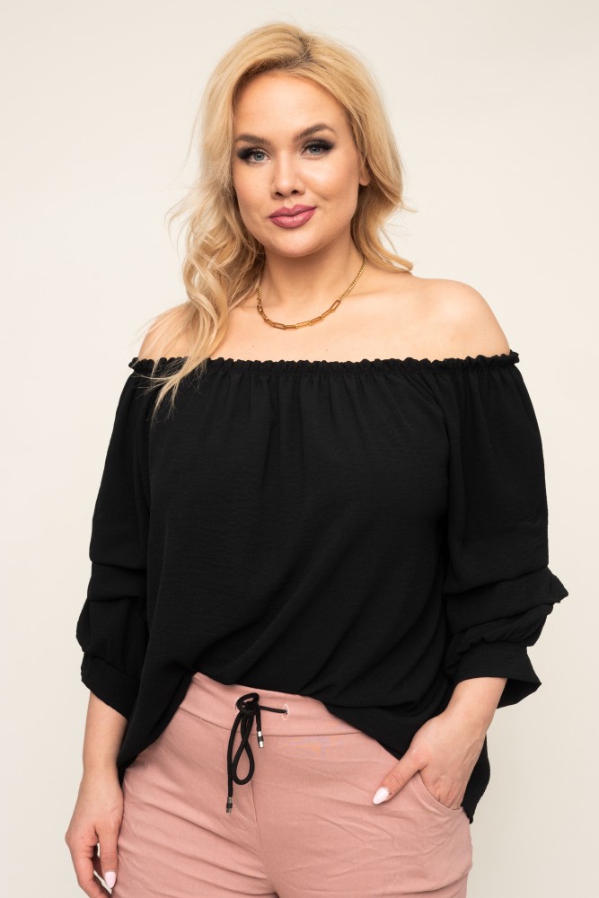 Svart bluse med volanger i ermene