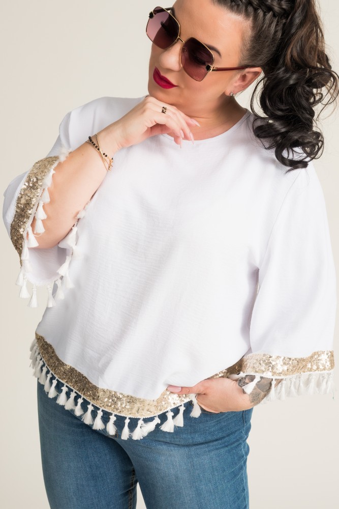 Blusa blanca y dorada con borlas