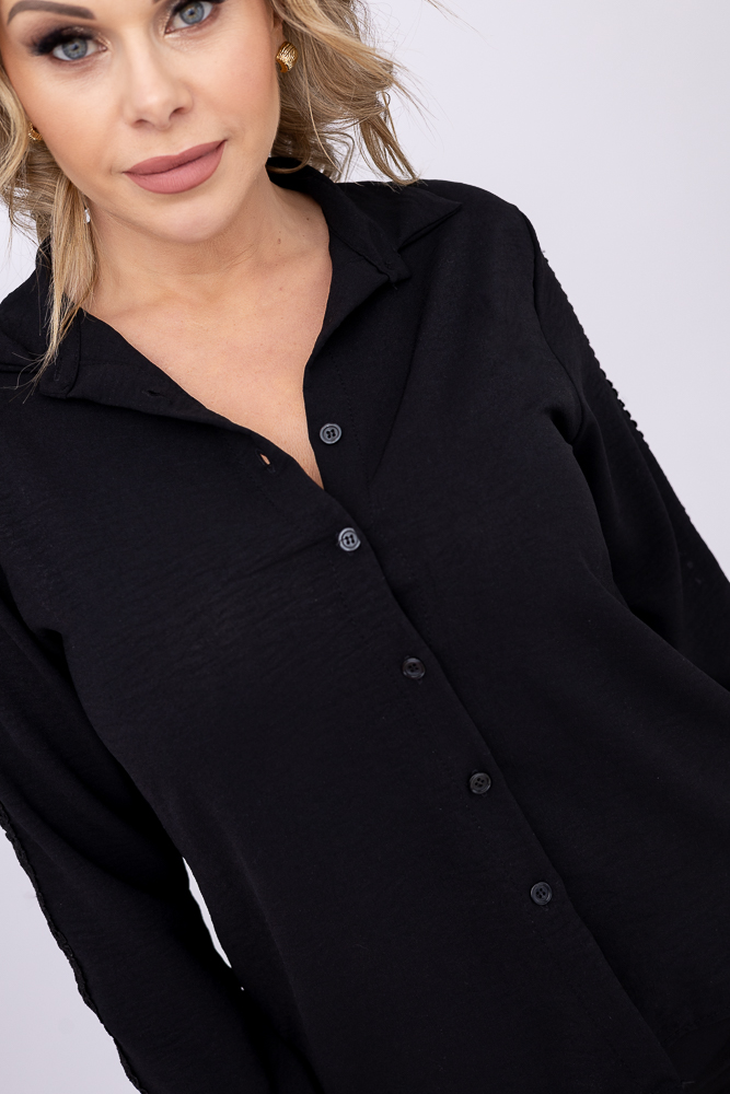 Camisa negra a rayas