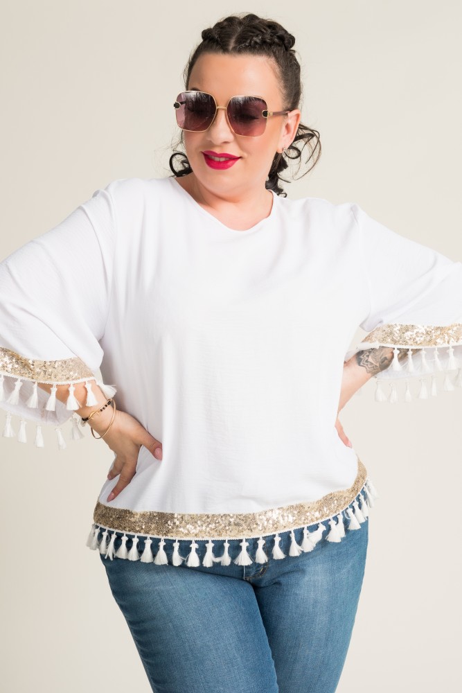 Blusa blanca y dorada con borlas