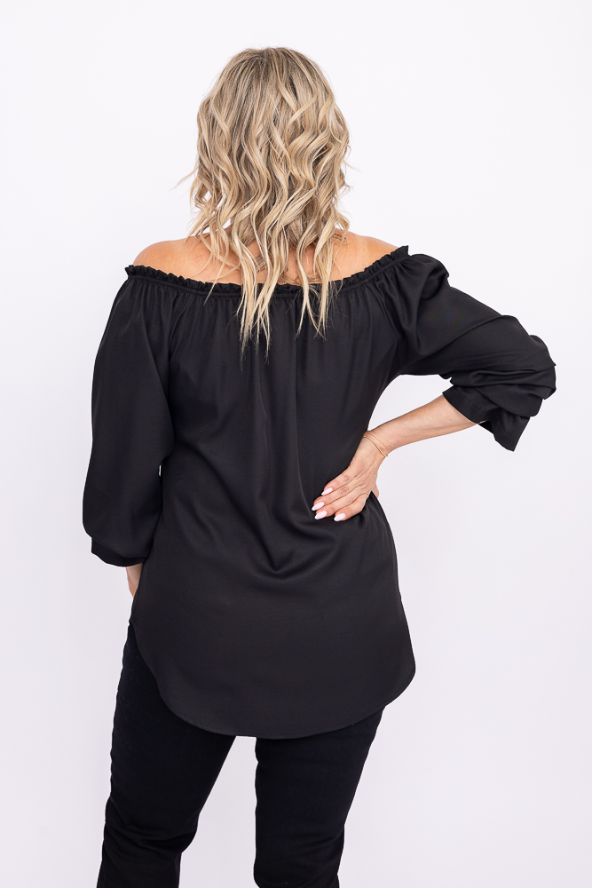Svart bluse med bundet utringning