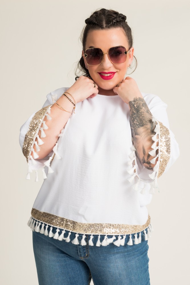 Blusa blanca y dorada con borlas